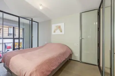 Un ou plusieurs lits dans un hébergement de l'établissement GuestReady - Gorgeous Duplex in Central Paris
