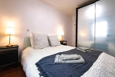 Un ou plusieurs lits dans un hébergement de l'établissement 6 Guests Flat Champs Elysees 2 BDR