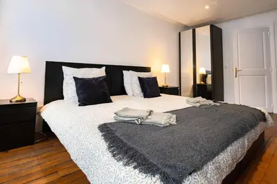 Un ou plusieurs lits dans un hébergement de l'établissement 6 Guests Flat Champs Elysees 2 BDR