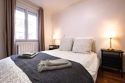 Un ou plusieurs lits dans un hébergement de l'établissement 6 Guests Flat Champs Elysees 2 BDR