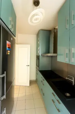 Cuisine ou kitchenette dans l'établissement Chambre privée design, 8 min du Parc des Prince et de Roland Garros et à 4 min du métro 9