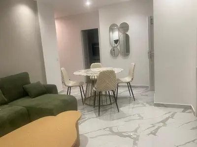 Coin salon dans l'établissement Chambre privée design, 8 min du Parc des Prince et de Roland Garros et à 4 min du métro 9