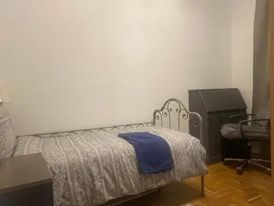 Un ou plusieurs lits dans un hébergement de l'établissement Chambre privée design, 8 min du Parc des Prince et de Roland Garros et à 4 min du métro 9