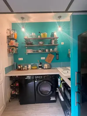 Cuisine ou kitchenette dans l'établissement Beautiful 2-room apartment in Paris's Batignolles district