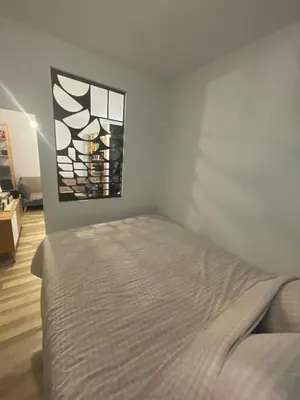 Un ou plusieurs lits dans un hébergement de l'établissement Beautiful 2-room apartment in Paris's Batignolles district