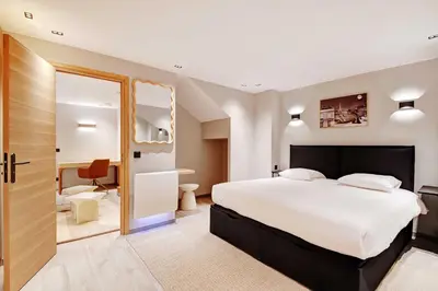 Un ou plusieurs lits dans un hébergement de l'établissement Modern souplex a c 2BR 6P– Near the Louvre Museum