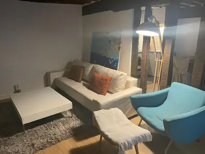 Coin salon dans l'établissement Practical 1-BR apartment next to Le Bon Marché