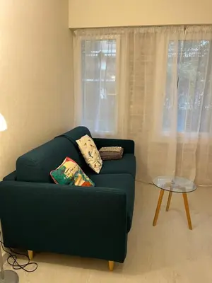 Coin salon dans l'établissement Studio Neuilly sur Seine bois