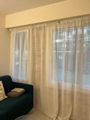 Coin salon dans l'établissement Studio Neuilly sur Seine bois