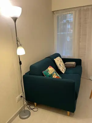 Coin salon dans l'établissement Studio Neuilly sur Seine bois