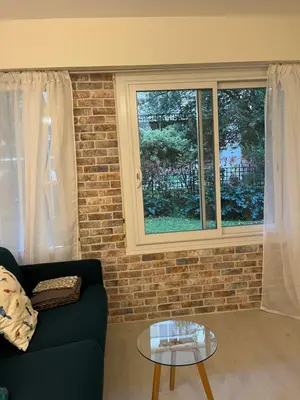 Coin salon dans l'établissement Studio Neuilly sur Seine bois