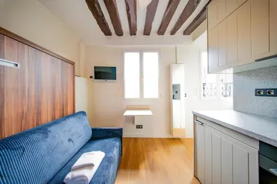 Cuisine ou kitchenette dans l'établissement Cute Blue Studio - Arts & Metiers