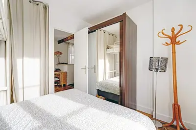 Un ou plusieurs lits dans un hébergement de l'établissement Tour Eiffel - Rue Cler