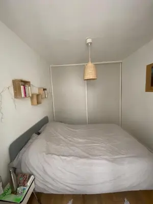 Un ou plusieurs lits dans un hébergement de l'établissement Quiet 2-room apartment in Paris