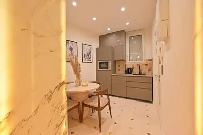 Cuisine ou kitchenette dans l'établissement Montparnasse Signature Apartments
