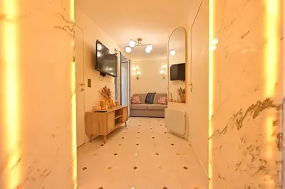 Télévision ou salle de divertissement dans l'établissement Montparnasse Signature Apartments