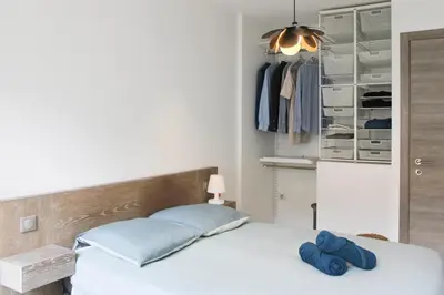 Un ou plusieurs lits dans un hébergement de l'établissement Stay in 2 at the heart of Paris near the Pantheon