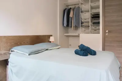 Un ou plusieurs lits dans un hébergement de l'établissement Stay in 2 at the heart of Paris near the Pantheon