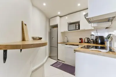 Cuisine ou kitchenette dans l'établissement Malakoff au coeur de Paris pour 6