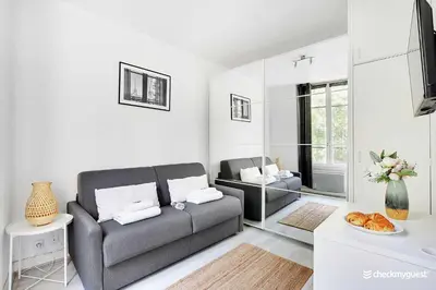 Coin salon dans l'établissement Amazing Studio in the heart of the Marais