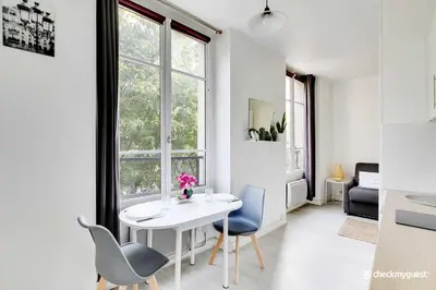 Coin salon dans l'établissement Amazing Studio in the heart of the Marais
