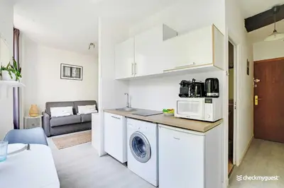 Cuisine ou kitchenette dans l'établissement Amazing Studio in the heart of the Marais