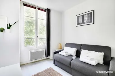 Coin salon dans l'établissement Amazing Studio in the heart of the Marais