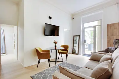 Télévision ou salle de divertissement dans l'établissement Modern apartment - 1BR 4P - Le Marais