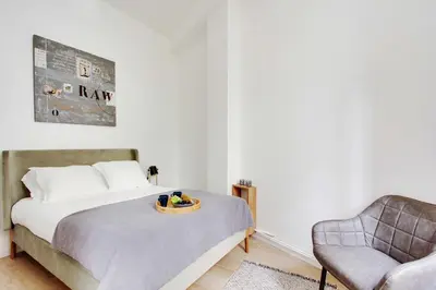 Un ou plusieurs lits dans un hébergement de l'établissement Modern apartment - 1BR 4P - Le Marais
