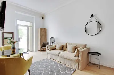 Coin salon dans l'établissement Modern apartment - 1BR 4P - Le Marais