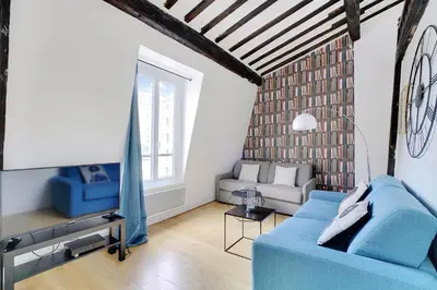 Coin salon dans l'établissement Parisian charm in the heart of the Marais !