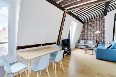 Coin salon dans l'établissement Parisian charm in the heart of the Marais !