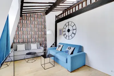 Coin salon dans l'établissement Parisian charm in the heart of the Marais !