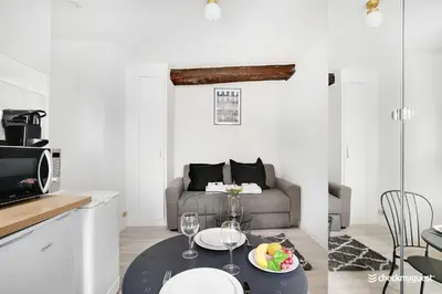 Coin salon dans l'établissement Amazing Studio in the heart of the Marais