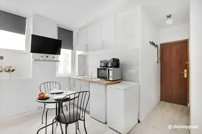 Cuisine ou kitchenette dans l'établissement Amazing Studio in the heart of the Marais