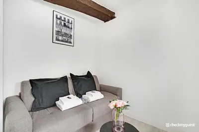 Coin salon dans l'établissement Amazing Studio in the heart of the Marais
