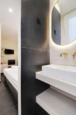 Un ou plusieurs lits dans un hébergement de l'établissement Modern studio - 2P - Place des Vosges