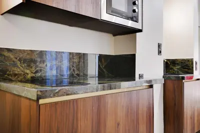 Cuisine ou kitchenette dans l'établissement Modern studio - 2P - Place des Vosges