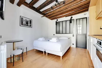 Un ou plusieurs lits dans un hébergement de l'établissement New studio for 2 people - Le Marais