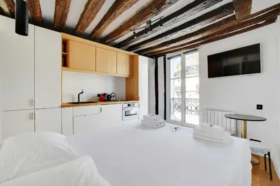 Un ou plusieurs lits dans un hébergement de l'établissement New studio for 2 people - Le Marais