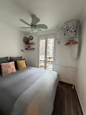 Un ou plusieurs lits dans un hébergement de l'établissement 20 sqm appartment with bedroom near Montmartre