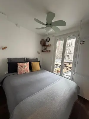 Un ou plusieurs lits dans un hébergement de l'établissement 20 sqm appartment with bedroom near Montmartre