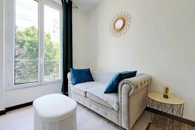 Coin salon dans l'établissement Apartment Suite 14 aux Portes de Paris