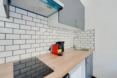 Cuisine ou kitchenette dans l'établissement Apartment Suite 14 aux Portes de Paris