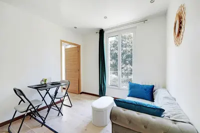 Coin salon dans l'établissement Apartment Suite 14 aux Portes de Paris