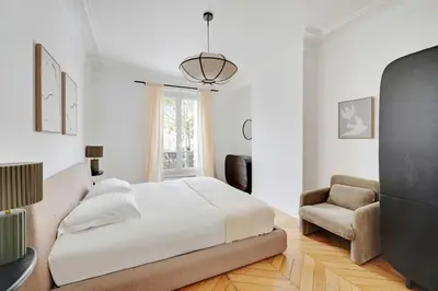 Un ou plusieurs lits dans un hébergement de l'établissement Modern flat - 6P- Voltaire