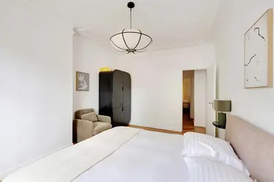 Un ou plusieurs lits dans un hébergement de l'établissement Modern flat - 6P- Voltaire