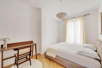 Un ou plusieurs lits dans un hébergement de l'établissement Modern flat - 6P- Voltaire