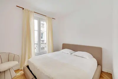 Un ou plusieurs lits dans un hébergement de l'établissement Modern flat - 6P- Voltaire