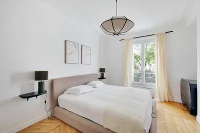 Un ou plusieurs lits dans un hébergement de l'établissement Modern flat - 6P- Voltaire